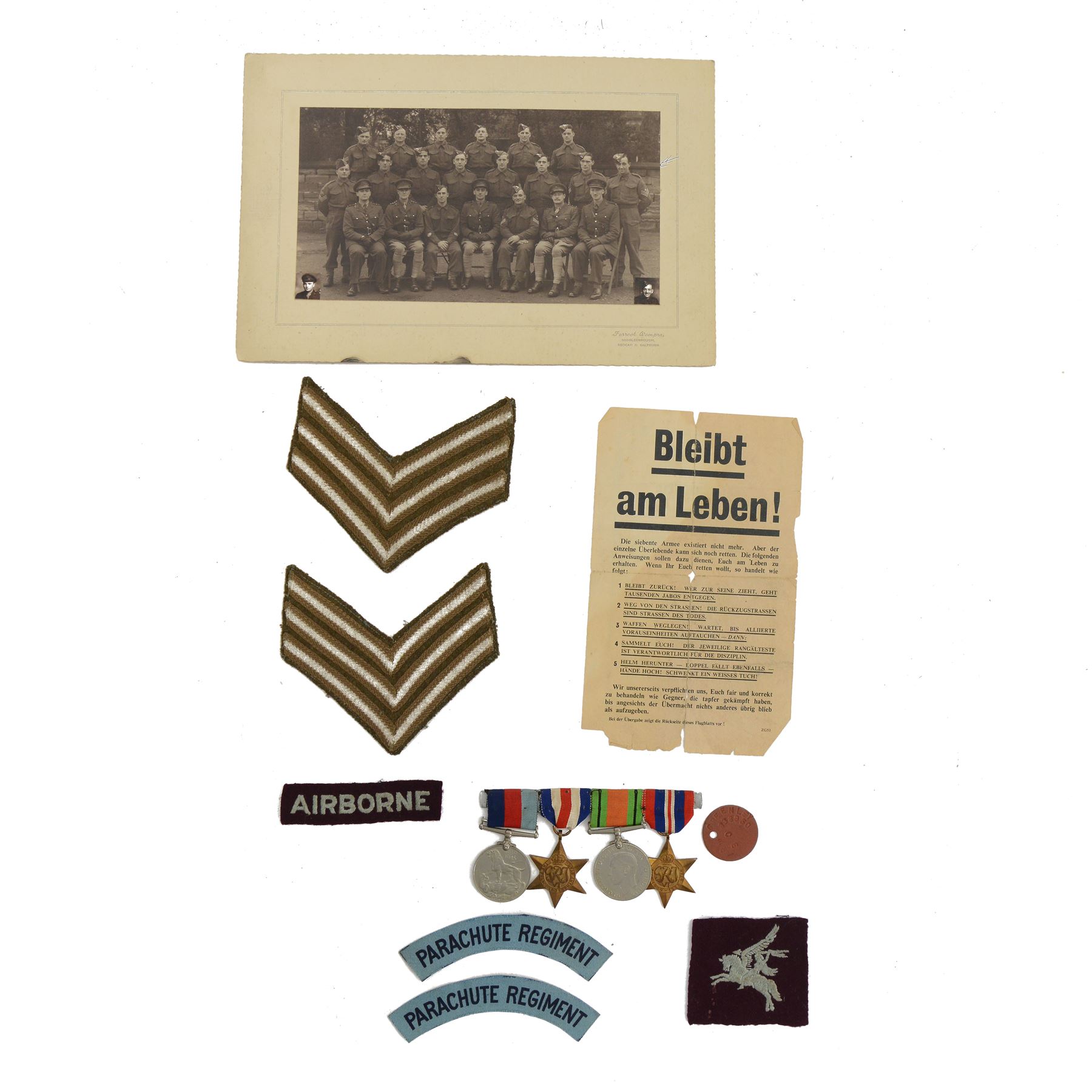 WWII Special Forces; Special Allied Airborne Reconnaissance Force relating Sgt. Raymond William Greenley, including set of four medals, The French and German Star, The 1939-1945 Star, Defence medal and War medal, together with	Parachute regiment shoulder titles, Pegasus insignia, soldiers release book, safe conduct leaflet, news article with first hand account from Sgt Ray Greenley of Newbiggin Malton and other ephemera
Sgt Ray Greenley was the first British paratrooper of the First Allied Airborne army to be dropped east of Rhine on 24th March 1945


