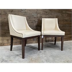 28 x walnut framed dining chairs, upholstered in beige leather