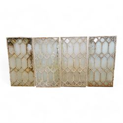 Four Victorian white painted cast iron window panels, 45cm x 90.5cm