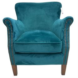 Contemporary tub-shaped armchair, upholstered in teal blue fabric, with high back and rolled arms accented with brass studded trim, on square tapered front feet