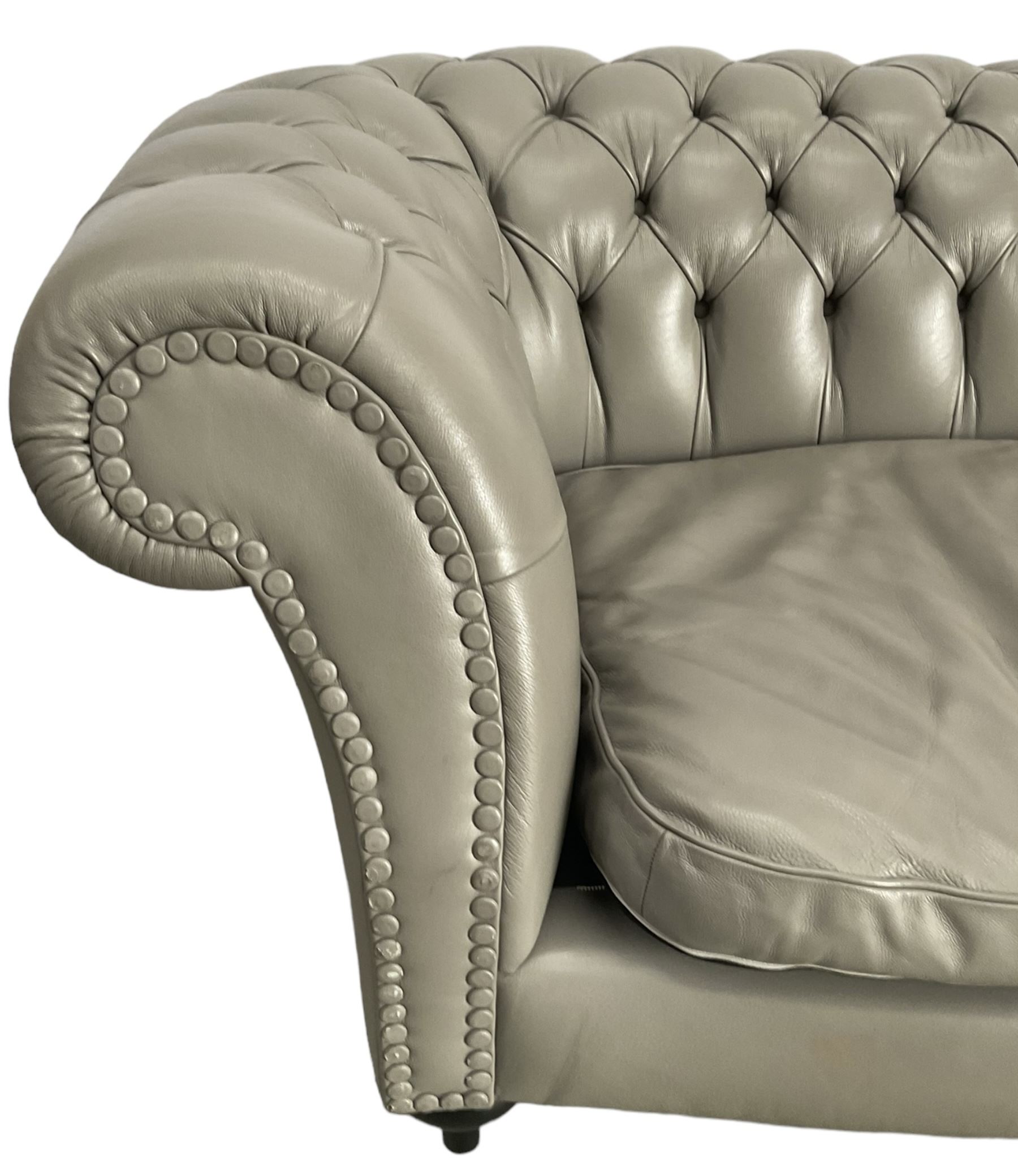 Three seat Chesterfield sofa, upholstered in grey buttoned leather