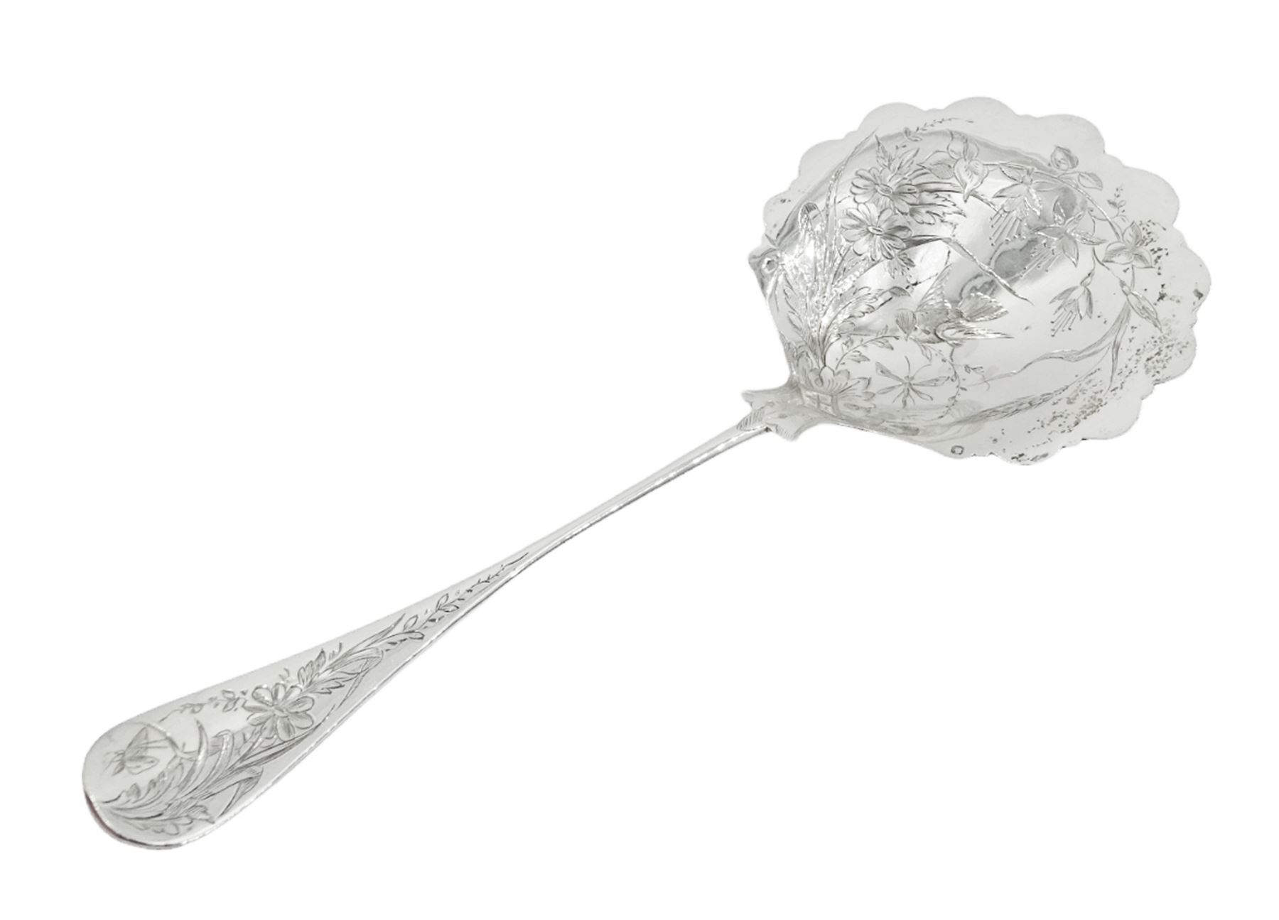 French silver aesthetic movement serving spoon, the scallop edged bowl engraved with a bird amongst flowers and foliage, stamped with Minerva's head standard and weevil export mark, L23cm