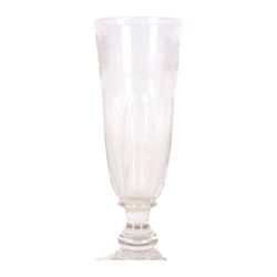 Early 19th century drinking glass, the part fluted funnel bowl engraved with leaves, upon a short knopped stem, and flat foot, H18cm