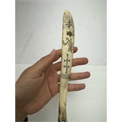 Inuit scrimshaw carved bone scraping knife, decorated with deer and tree, L25cm