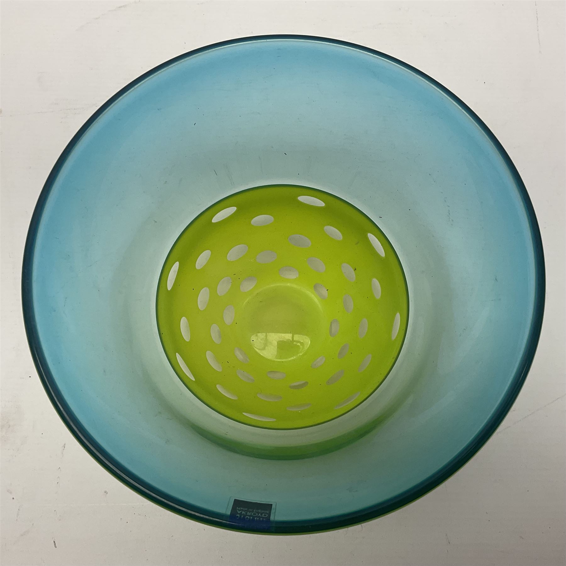 Stuart Akroyd glass vase, blue banded top and lime green opaque lower section with bubble inclusions, with sticker and engraved signature beneath, H15cm