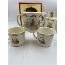 Royal Doulton Bunnykins teawares, including teacups and saucers, egg cup, money boxes etc (12)