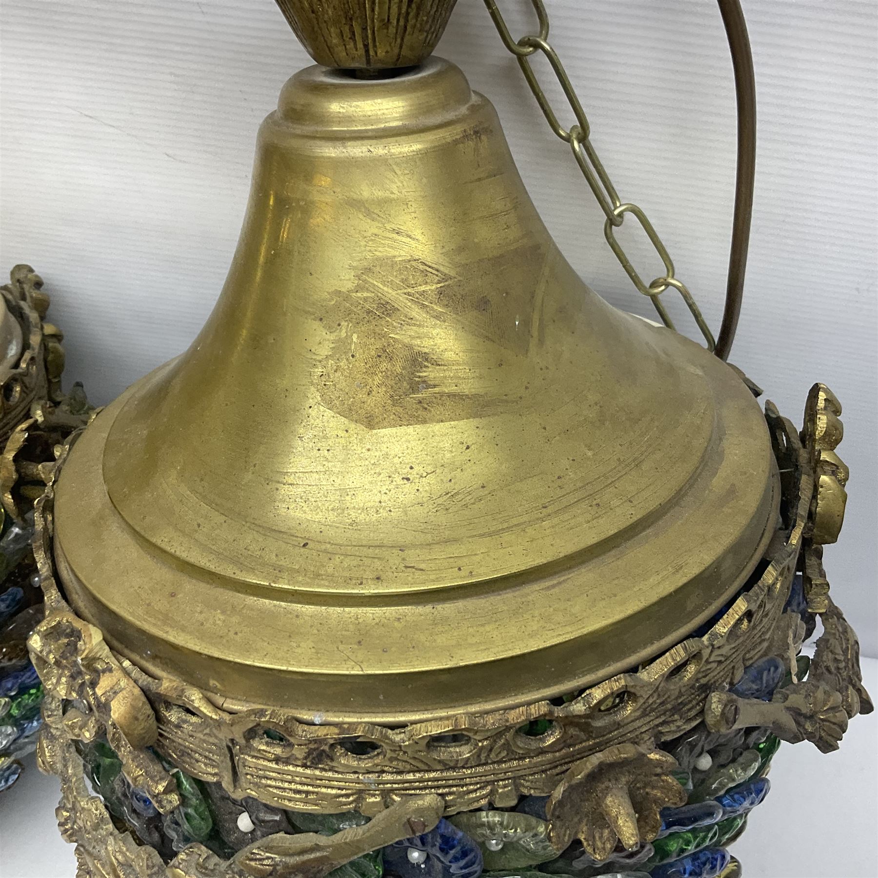 Two 20th century brass and murano glass pendent lanterns, each lantern is decorated with individual multi-coloured glass flowers, suspended from brass cover with floral swags, H40cm