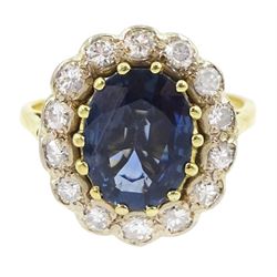 18ct gold oval cut sapphire and round cut diamond cluster ring, stamped, sapphire approx 2...