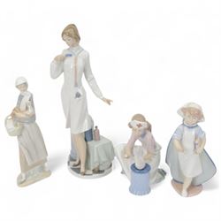 Four Lladro figures, comprising Loving Care no 6087, Young Nurse no 6307, Girl with Chicke...