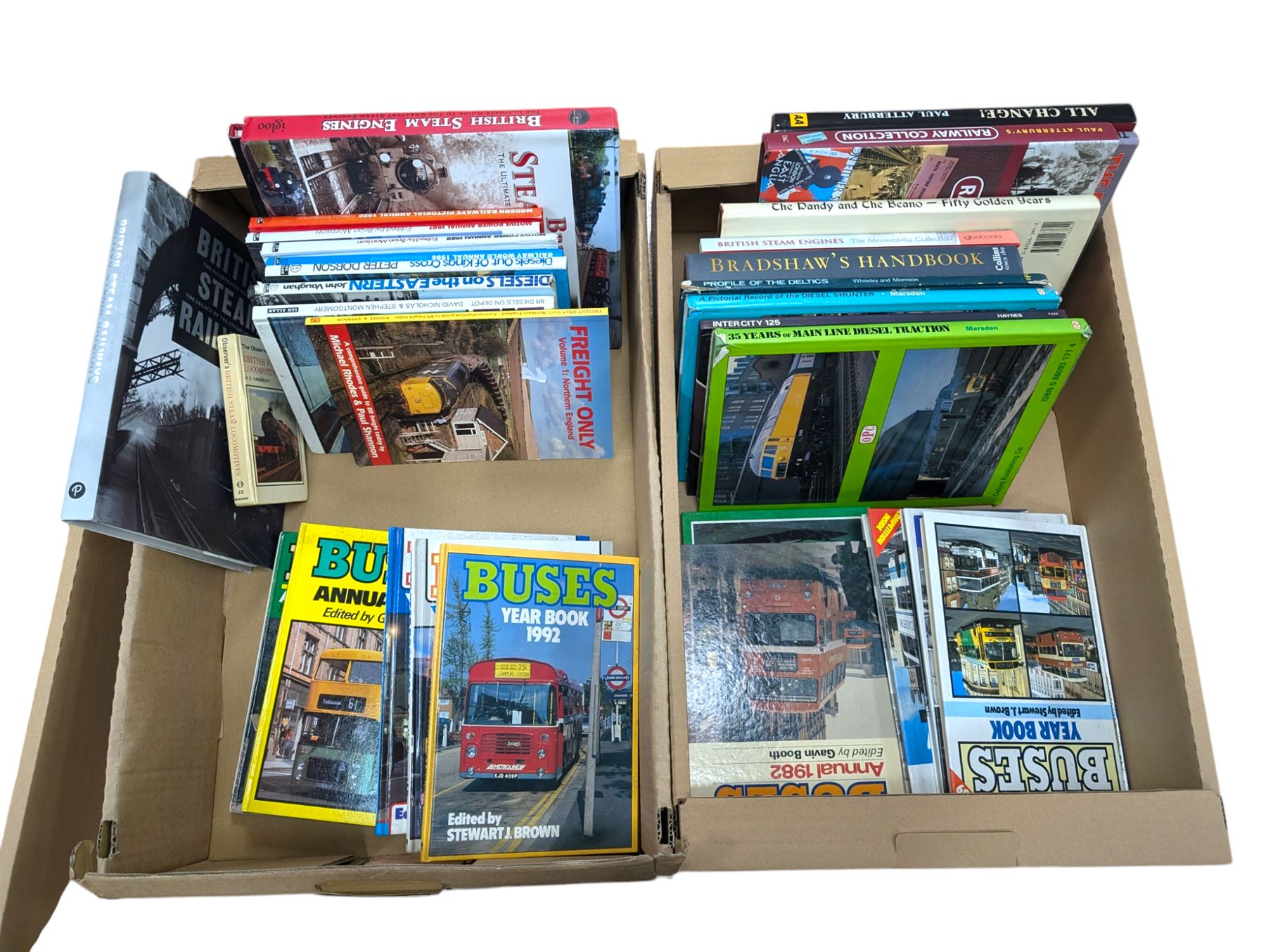 Railway and transport reference books, including several editions of Buses Year Book 1981-1992, in two boxes