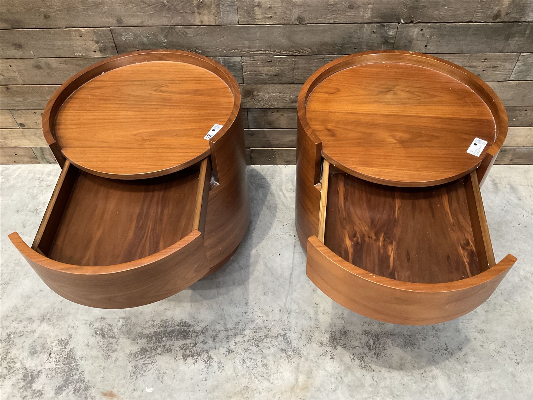 Pair of walnut circular barrel shaped lamp tables, fitted with single drawer