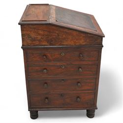 Early 19th century rosewood Davenport, sliding top section enclosed by moulded lid with leather inset, the interior fitted with single drawer, four graduating cock-beaded drawers to the right hand side and four false drawers to the opposing side, on turned feet 