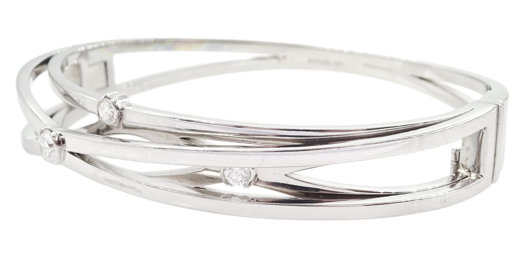 Boodles 'Labyrinth' platinum round brilliant cut diamond bangle, London 2009, total diamond weight approx 0.50 carat