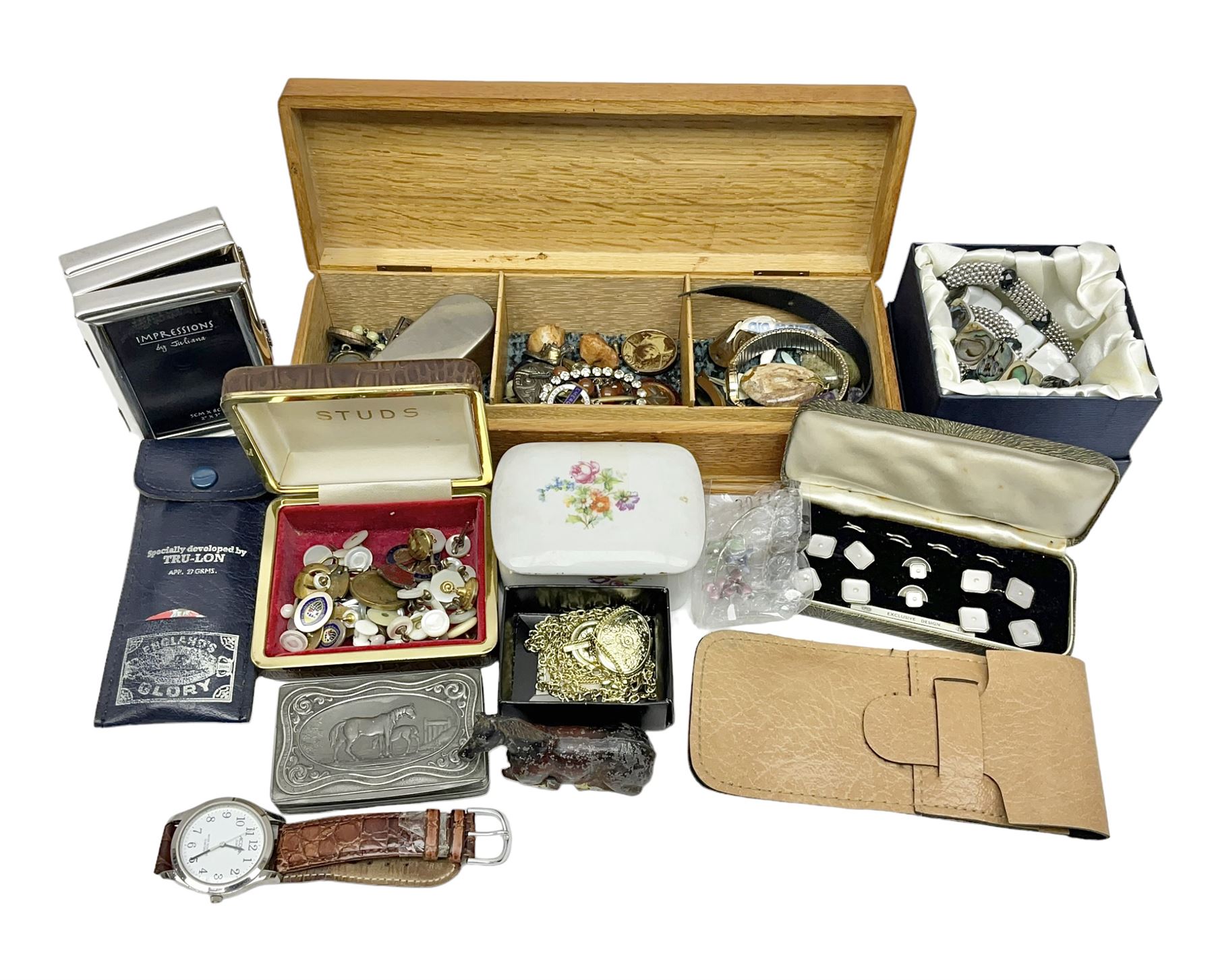 Silver brooch and a collection of costume jewellery, together with ceramic trinket box, foldable photograph frame and other collectables