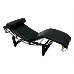 After Le Corbusier, Pierre Jeanneret, and Charlotte Perriand - LC4 chaise longue, black leather upholstery with cylindrical headrest, supported by a chromed tubular steel frame, with cantilever design with elastic webbing