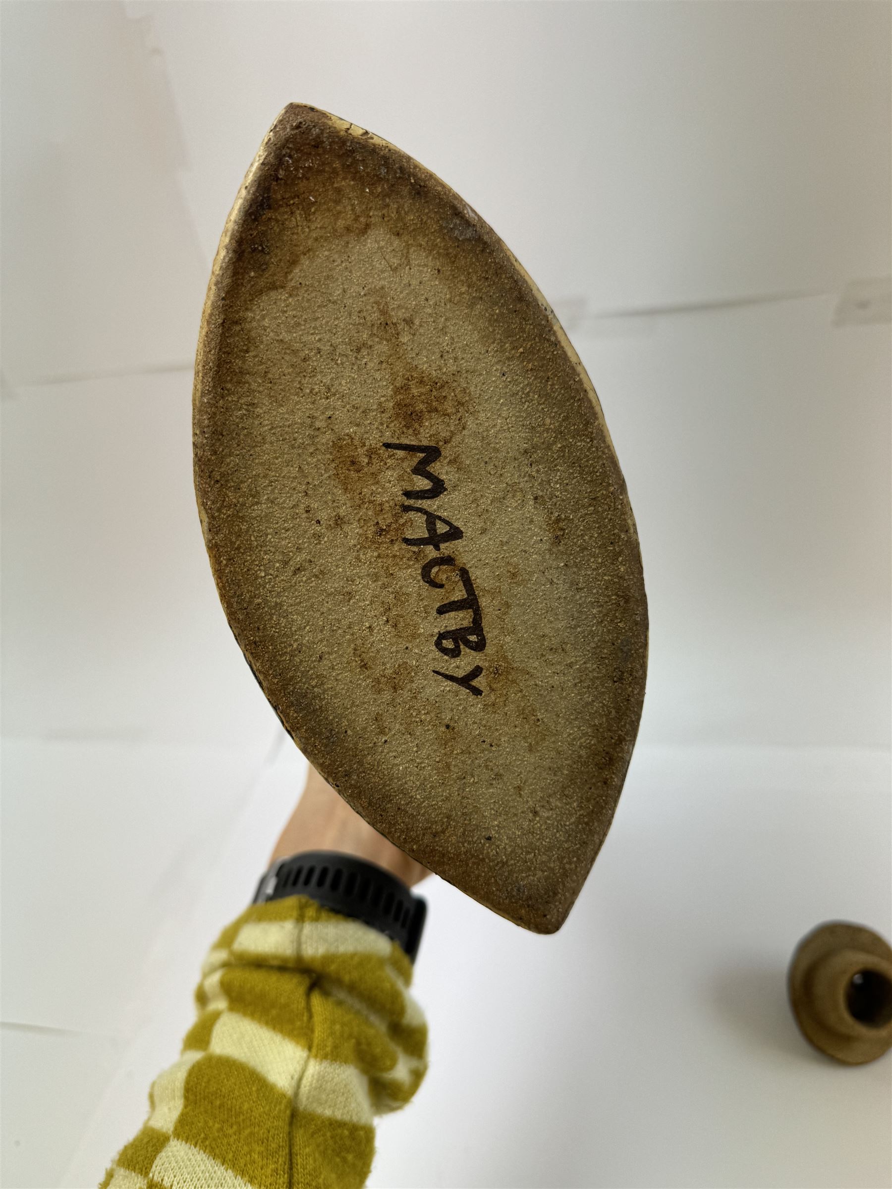 John Maltby (British 1936-2020): studio pottery teapot decorated with flowers, the spout and handle with tenmoku glaze, signed beneath, including handle H29cm