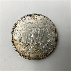Two United States of America silver Morgan dollars dated 1885 O, 1888 O, King George V 1935 crown coin, and Mexico 1968 twenty-five pesos coin