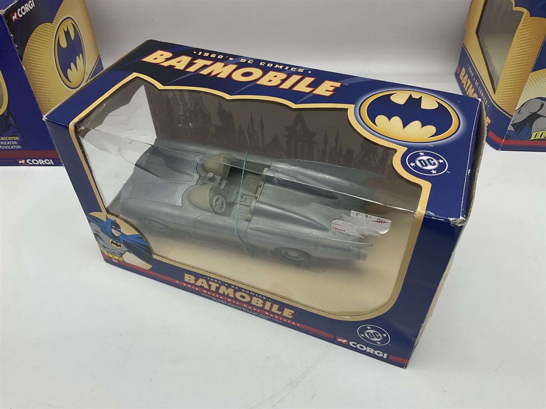 Five Corgi Batmobile die-cast vehicles from the DC Comics collection, to include 1940’s DC Comics BMBV2 1:18 and BMBV1 1:24 scale Batmobiles, all in original boxes 