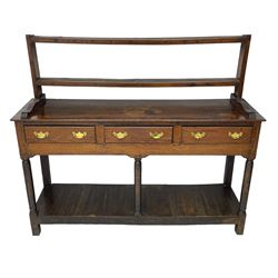 18th century oak dresser, raised three tier plate rack with moulded cresting rail, rectangular top over three drawers, the drawer fronts with moulded edges, turned supports united by pot board base 