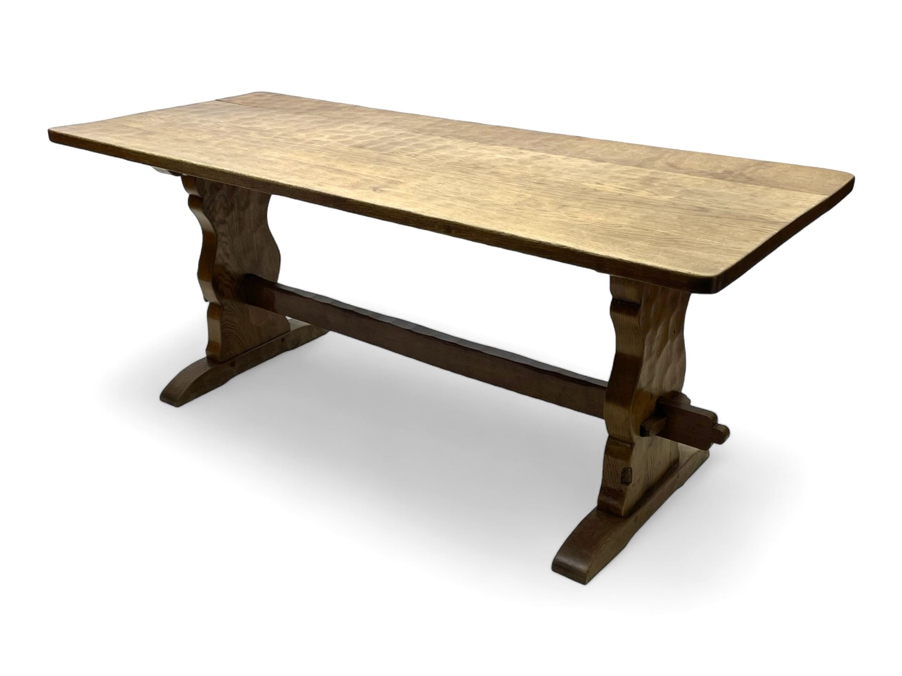 Gnomeman - oak dining table, rectangular adzed top, shaped end supports on sledge feet united by pegged stretcher, by Thomas Whittaker, Littlebeck, Whitby 