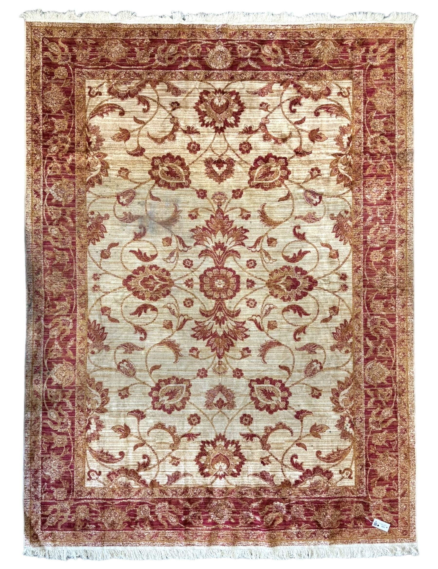 Persian Ziegler design amber ground rug, the field decorated with scrolling foliate decoration, enclosed by a border of repeating palmettes