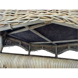 Mid-20th century hexagonal wicker coffee table, featuring woven top with pattern that radiates from the centre, lower shelf for additional storage, supported by interwoven wicker legs