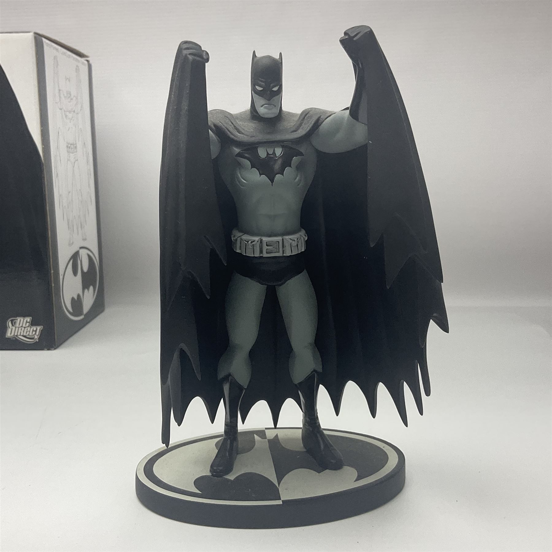 Group of five limited edition DC Direct Black and White Batman hand-painted cold-cast porcelain statues in original boxes, with two similar examples from DC Collectibles 