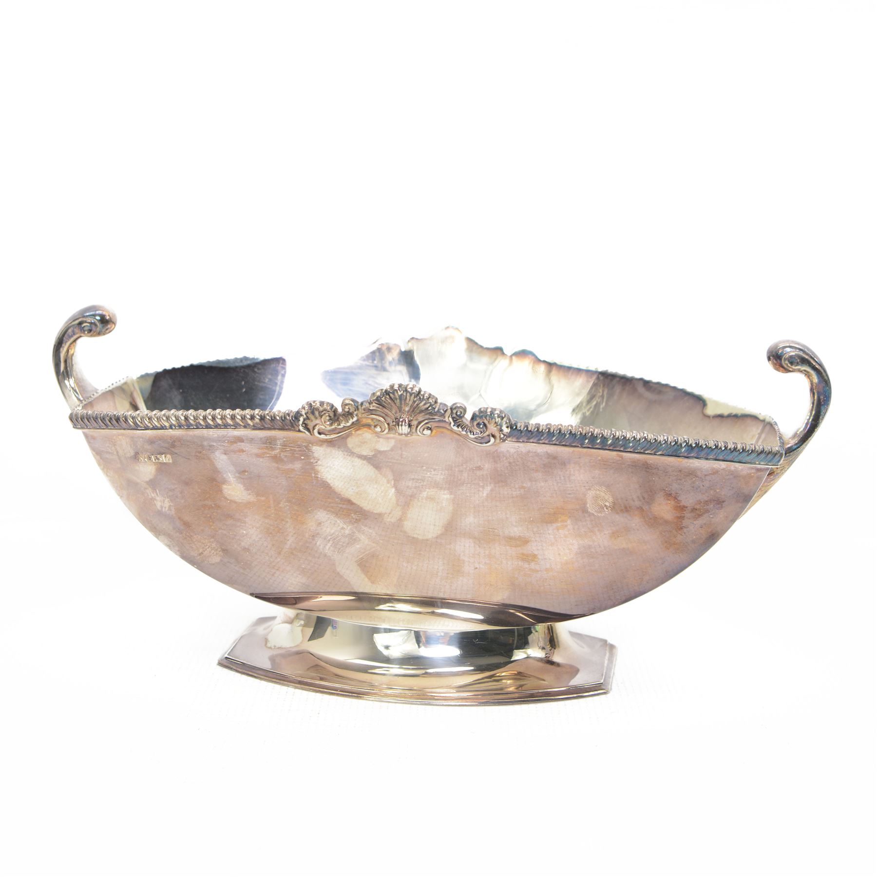 Silver rectangular fruit dish with gadrooned and shell moulded border, scroll handles and short pedestal foot W30cm Sheffield 1985 Maker Asprey & Co. Ltd