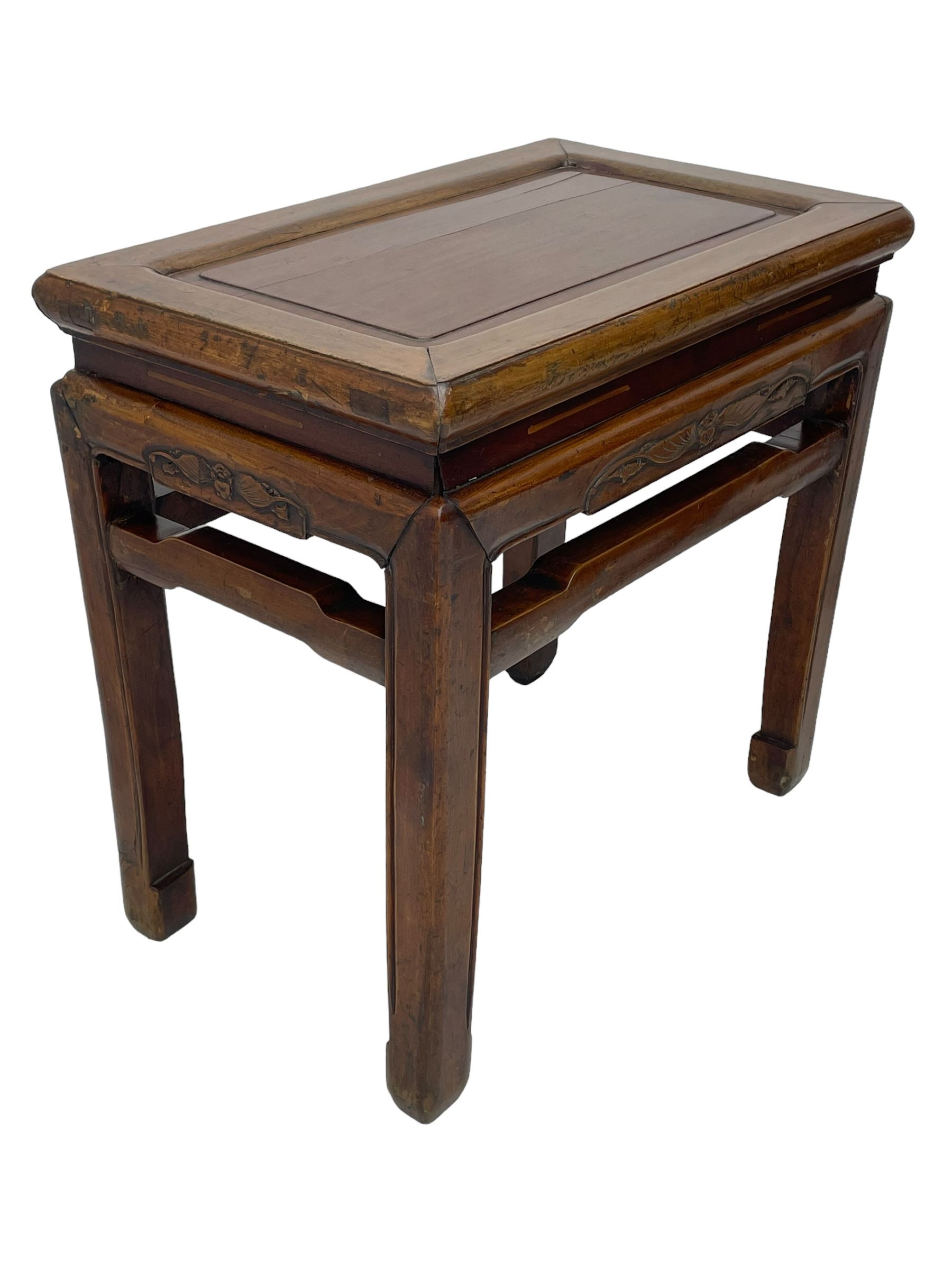 Pair of Chinese Hong Kong hardwood side tables, rectangular panelled top within moulded frame, the frieze rails carved with bats, on square supports terminating to hoof feet, united by shaped upper rails