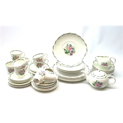 A Susie Cooper for Wedgwood Fragrance pattern tea service, comprising teapot, milk jug, open sucrier, fix teacups, five smaller teacups, five saucers, four further saucers, six side plates, five side plates with frilled rim, a slightly larger side plate, six dessert plates, six larger plates, six bowls, and a sandwich plate. 