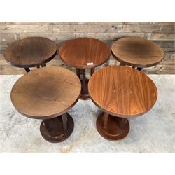 Five walnut circular bar or bedroom occasional tables