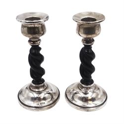 Pair of 1920s silver mounted ebonised barley twist candlesticks, hallmarked Payton, Pepper & Co, Chester 1927, H15cm