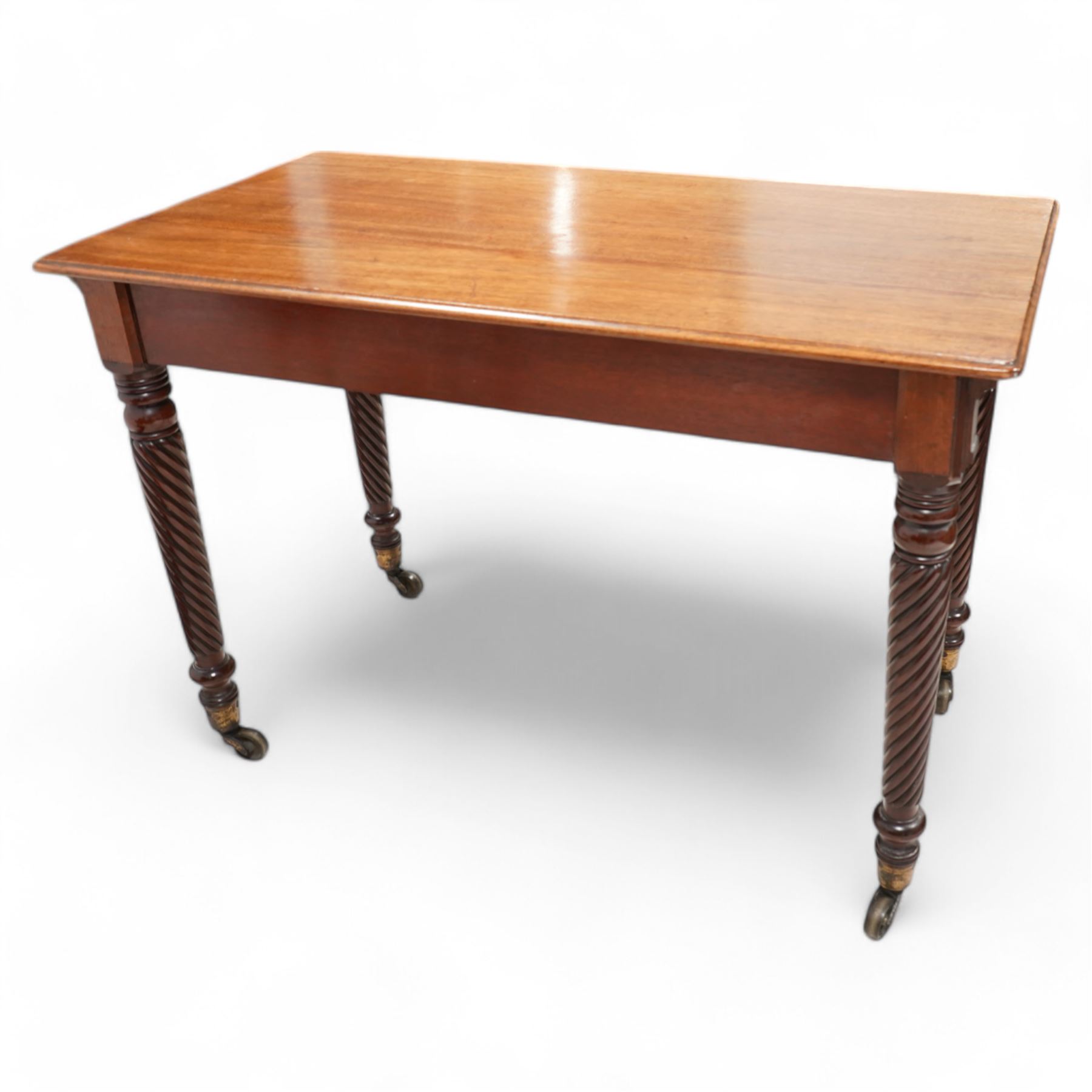 Victorian mahogany side table, moulded rectangular top over two drawers, on rope twist supports with brass cups and castors 