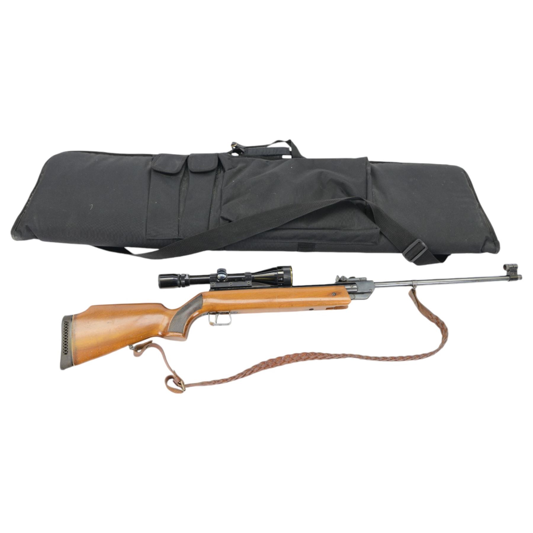 German Air Rifle, the 50cm barrel marked Cal 5.5/22, made in Germany, with Nikko Stirling Silver Crown 3.9x40 scope, overall L114, in a Logun rifle bag 