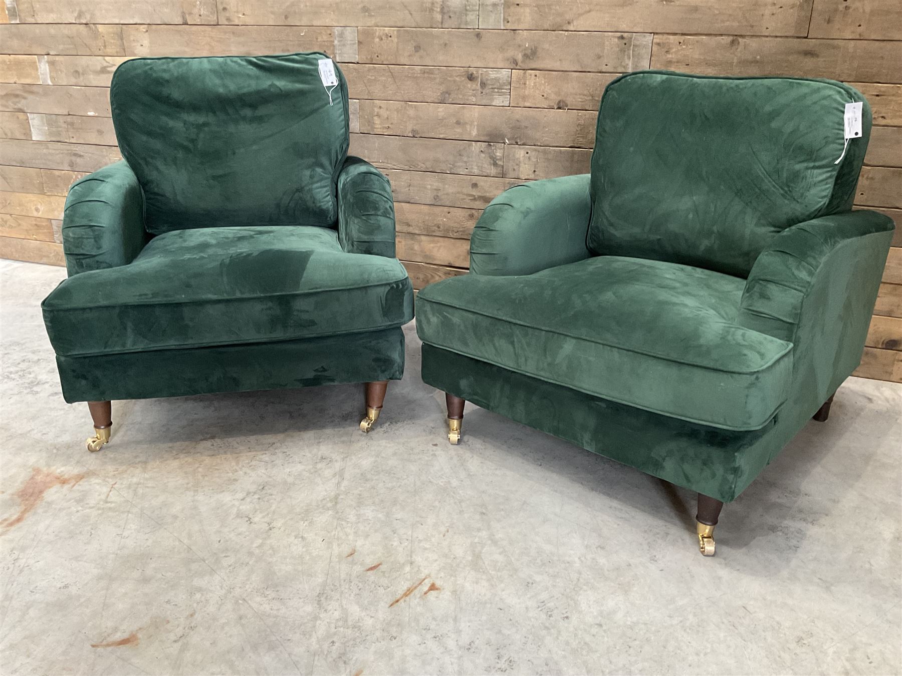 Pair of Howard design armchairs, upholstered in jade green velvet fabric