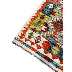 Chobi Kilim ivory ground rug, the busy multi-coloured field decorated with two concentric lozenges, the guard lines decorated with broken-lozenge motifs and geometric designs