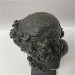 Bronze bust, modelled as a maiden in classical drapery and adorned with floral swags, upon a fluted socle base, overall H23.5cm