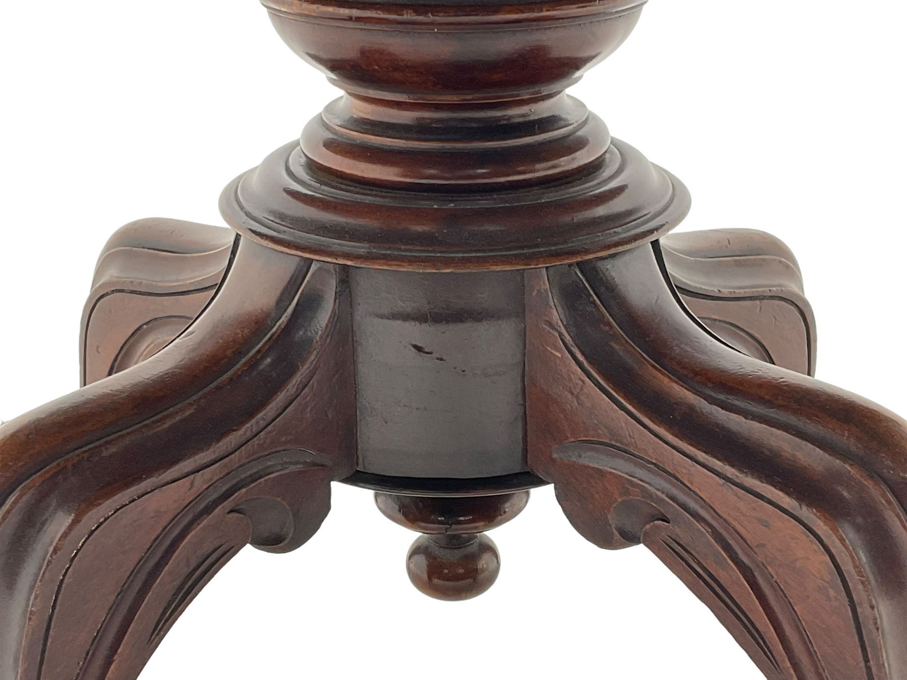 Victorian mahogany loo or dining table, oval moulded tilt-top on turned pedestal, four out splayed supports with scrolled carved terminals (137cm x 101cm, H75cm); together with set of four Victorian dining chairs upholstered in pale buttoned fabric, on turned front supports with brass and ceramic castors  