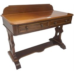 Victorian mahogany washstand, raised back over rectangular top with rounded front corners, two frieze drawers with moulded fronts and turned handles, shaped and pierced end supports on sledge feet, united by shaped flat stretcher 