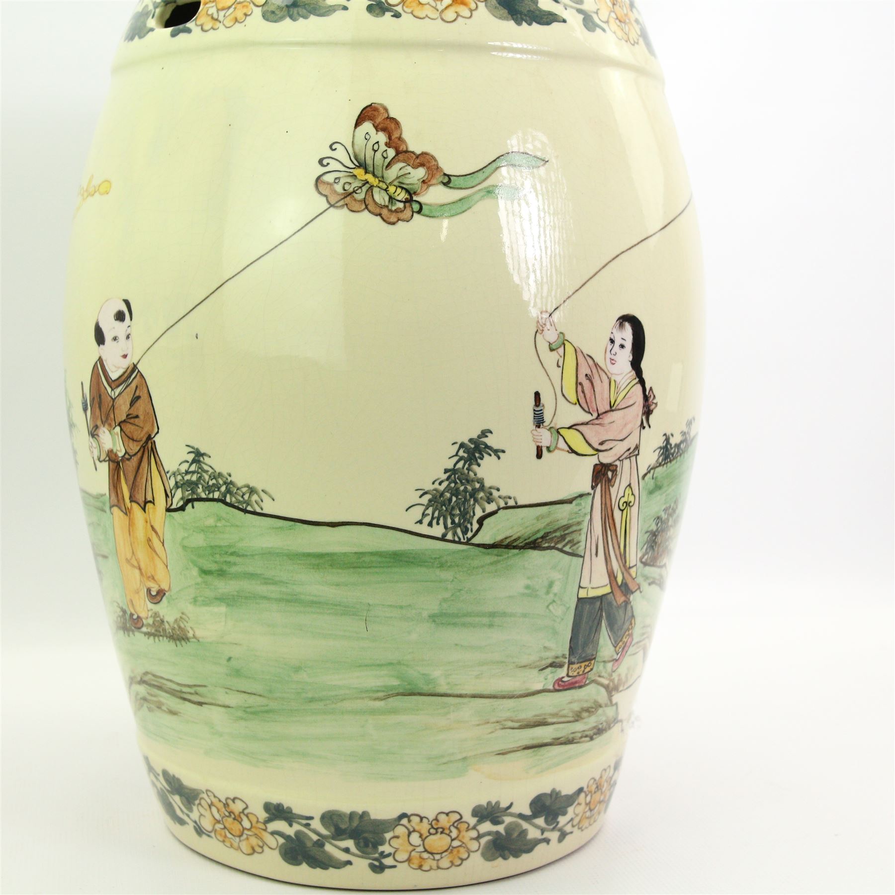 20th century oriental ceramic garden stool, of barrel form, painted with children playing in a rocky landscape, H45cm 