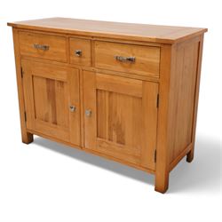 Light oak sideboard, fitted with three drawers and two cupboards