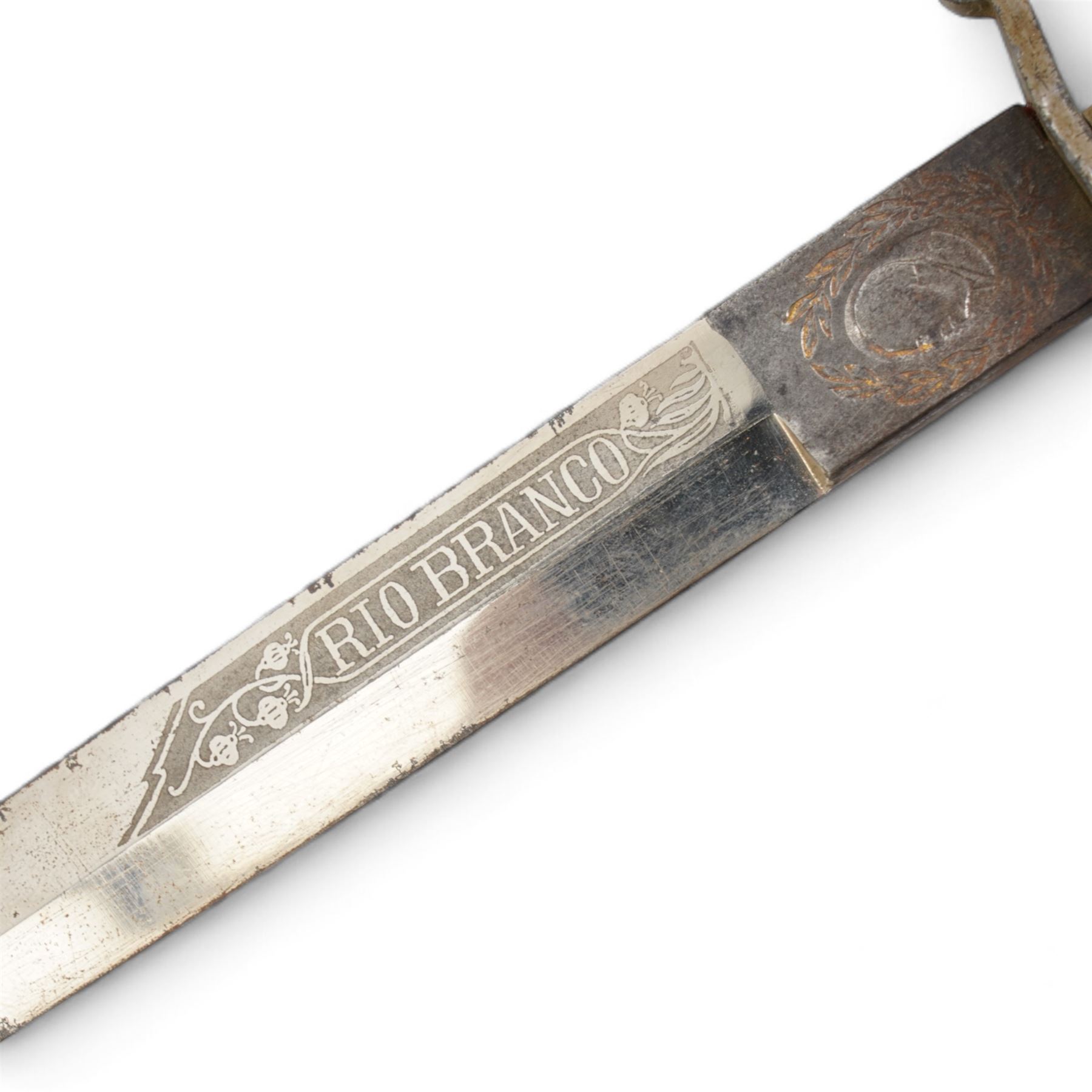 North African arm dagger with leather scabbard, blade length 19cm and a South American hunting knife, the ricasso marked 'Rio Branco', blade length 18cm (2) 