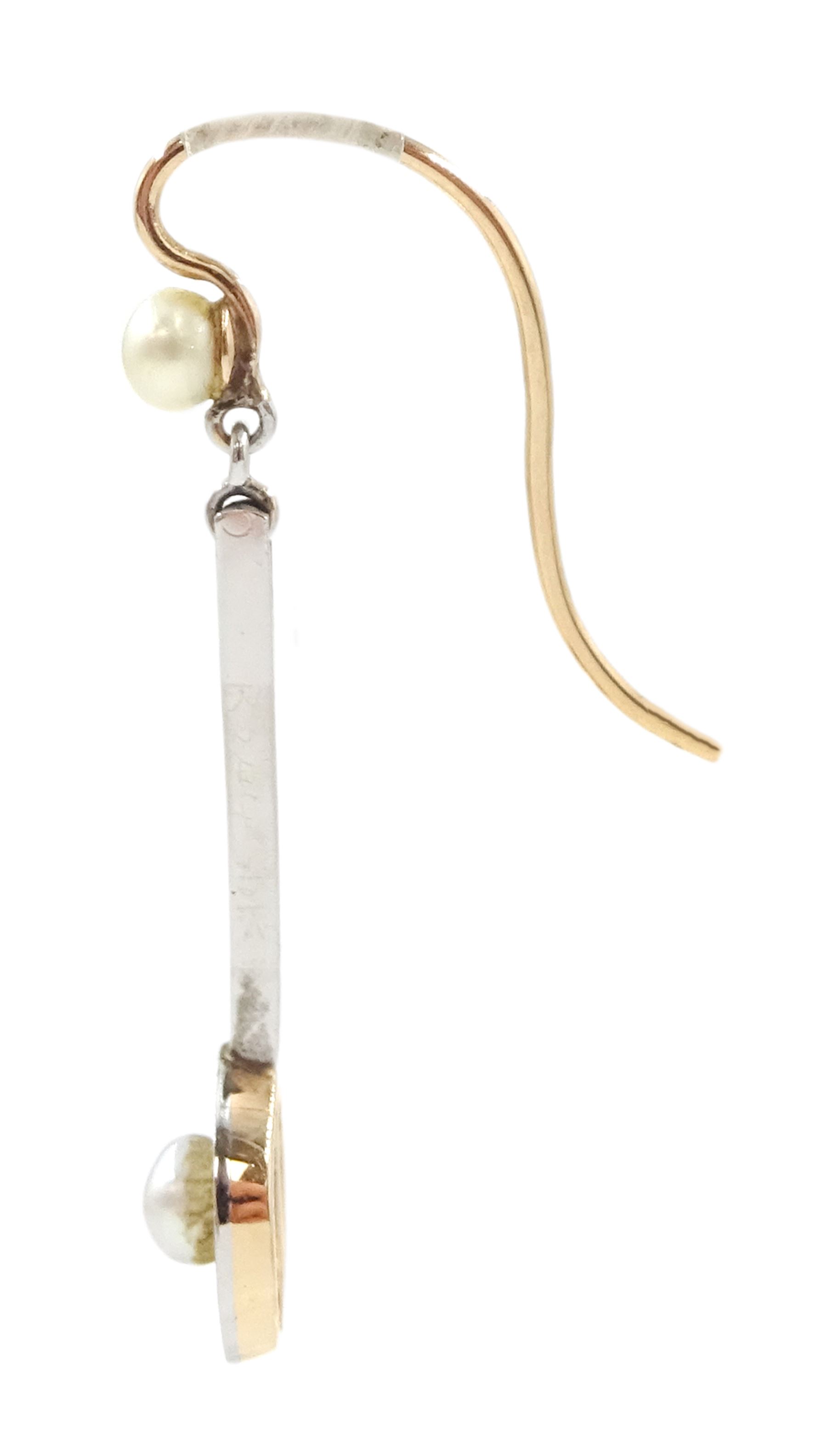 Pair of early 20th century 15ct gold and platinum pearl pendant earrings, pearls within hoop frames and suspended from knife edge bars to pearl surmounts 