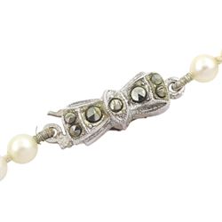 Mikimoto single strand cultured cream / white pearl necklace, with silver marcasite clasp, boxed