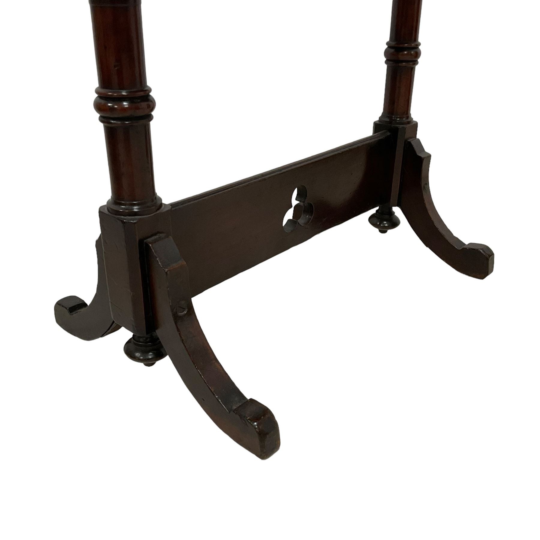 Late Victorian walnut ecclesiastical side table, rectangular top with stop chamfered edge, on turned supports united by rectangular stretcher pierced with trefoil, on splayed feet 