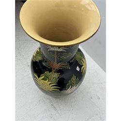 Floor vase with stylised flowers on a black ground, H84cm