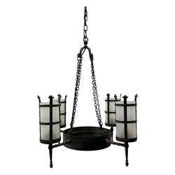 Wrought metal ceiling light, four branch with strapwork lanterns (D55cm); together with a pair of matching wall sconces (H32cm)