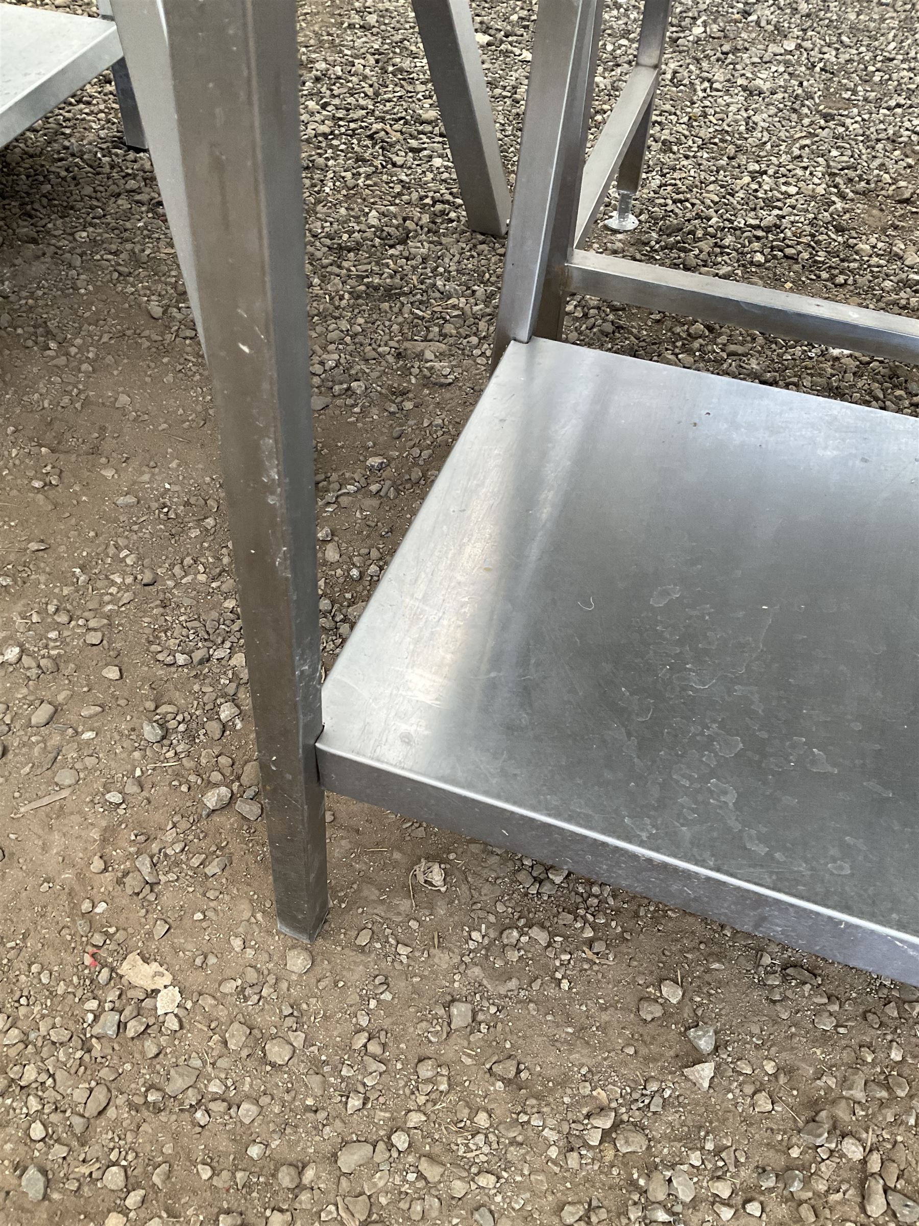 Stainless steel two tier preparation table - movement in legs - THIS LOT IS TO BE COLLECTED BY APPOINTMENT FROM DUGGLEBY STORAGE, GREAT HILL, EASTFIELD, SCARBOROUGH, YO11 3TX