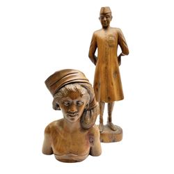Balinese carved hardwood female bust, incised beneath A FATIMA BALI, H29cm, together with a carved hardwood figure of a man, H50.5cm, (2)