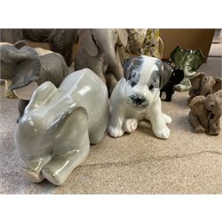 Group of ceramic and resin animal figures, mostly elephants, to include USSR model of a seated Terrier puppy, and a USSR model of a baby elephant, in one box